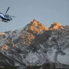 Helicopter view flying towards Muktinath Temple in the Mustang region of Nepal, with views of the Himalayas