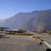 Helicopter in flight from Khare (Mardi Himal base camp) to Lukla airstrip, a short 15-18 minute high-altitude transfer in Nepal