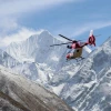 Helicopter flying over Langtang Valley with snow-capped Langtang Lirung peak and glaciers for Kyanjin Gompa helicopter tour from Kathmandu